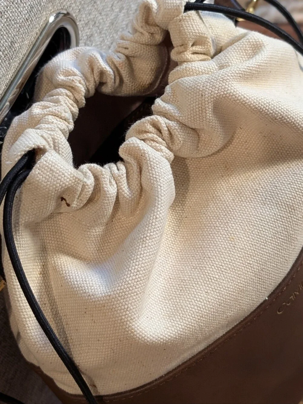 Calvin Klein Brown and Cream Canvas Drawstring Crossbody Bucket Bag Equestrian